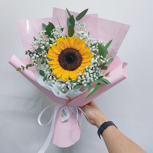 Single Sunflower with Gypsophila and Eucalyptus in Pink Paper Bouquet