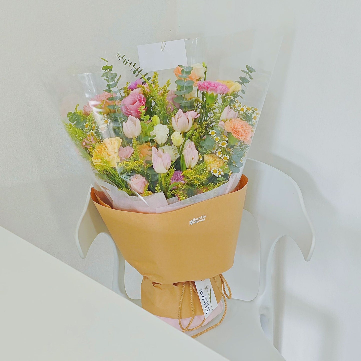Assorted Flowers in Yellow, Pink and Orange with Pink Tulips Minimal Style Bouquet