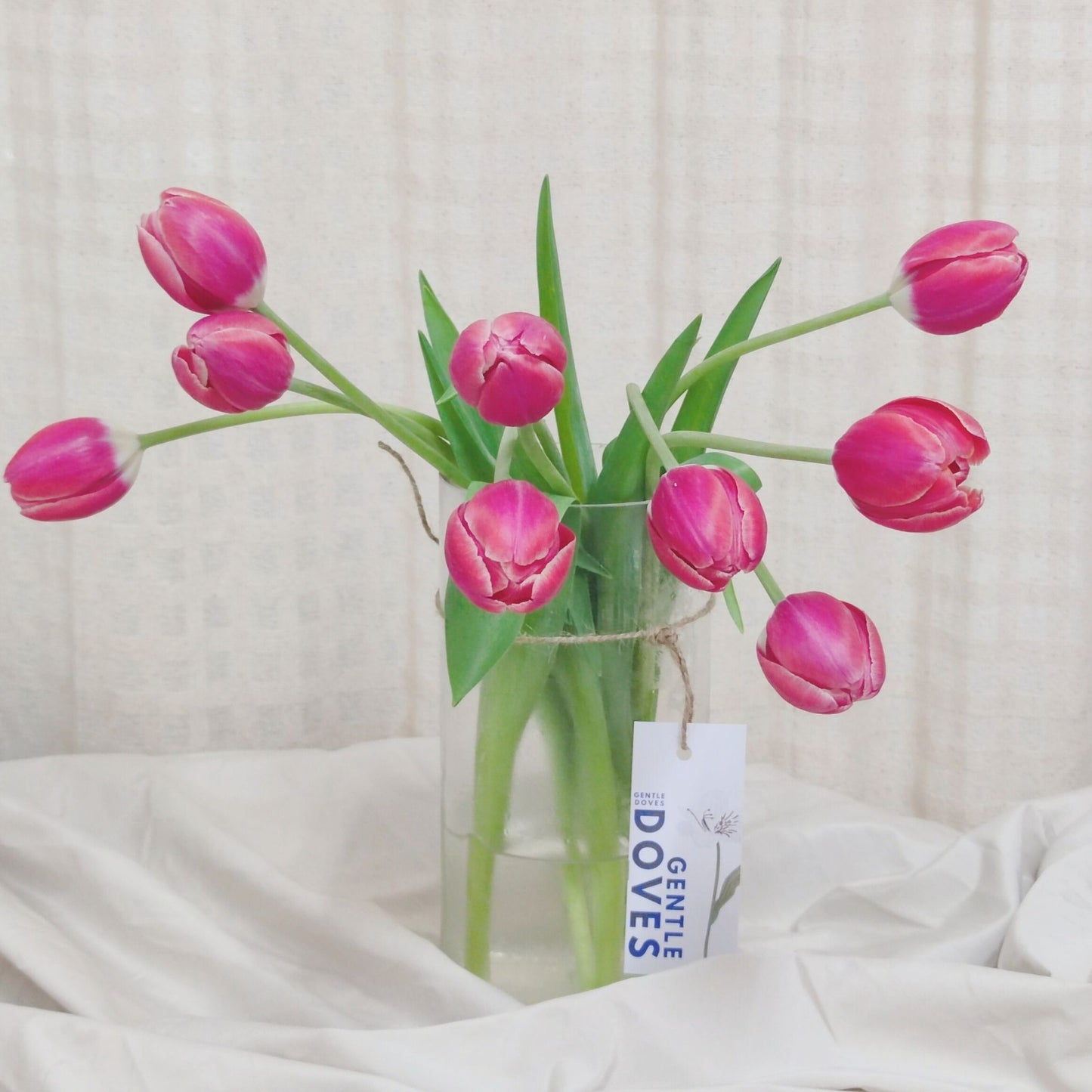 Nine Red Tulips in Large Vase Arrangement