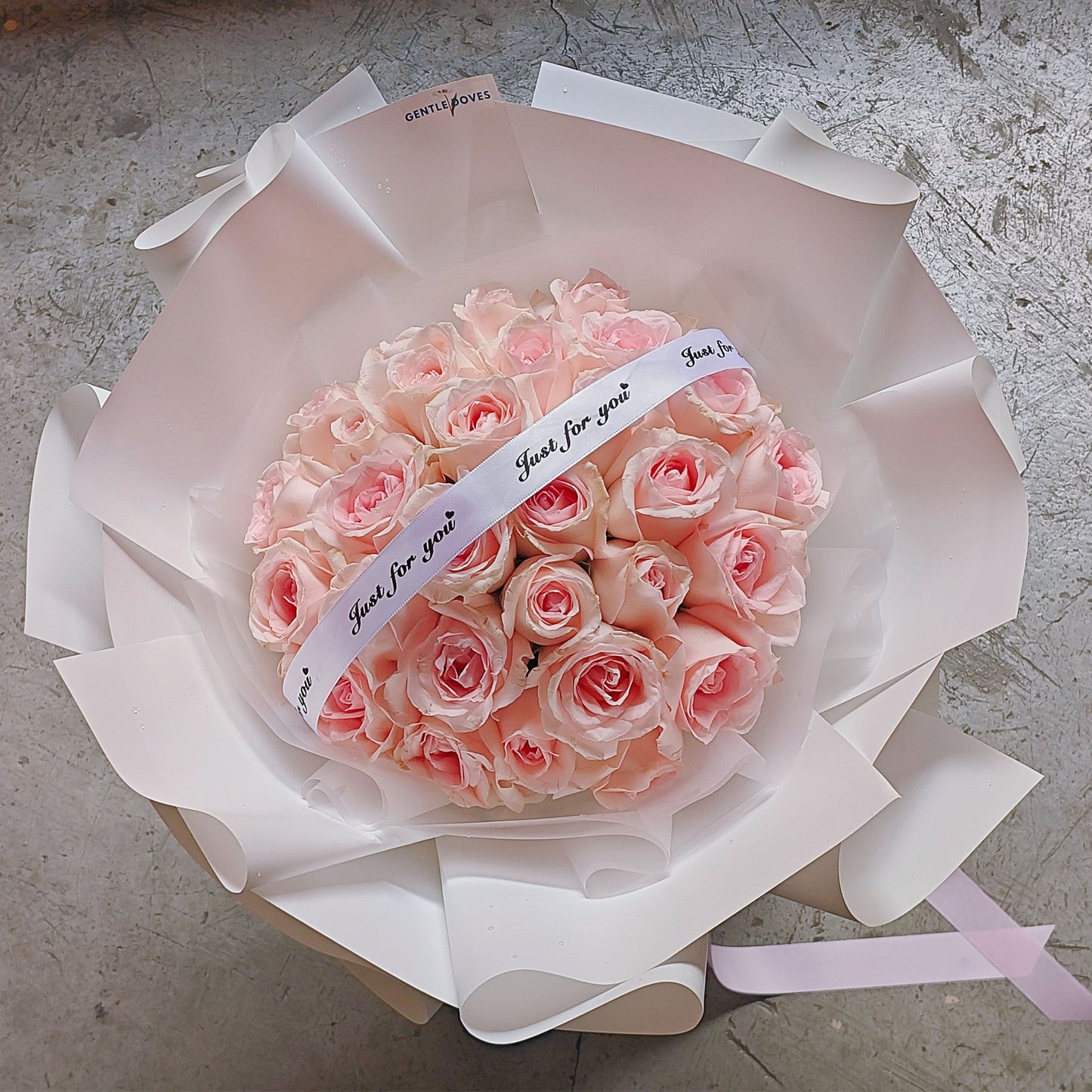 Thirty Soft Pink Roses in White Paper Bouquet