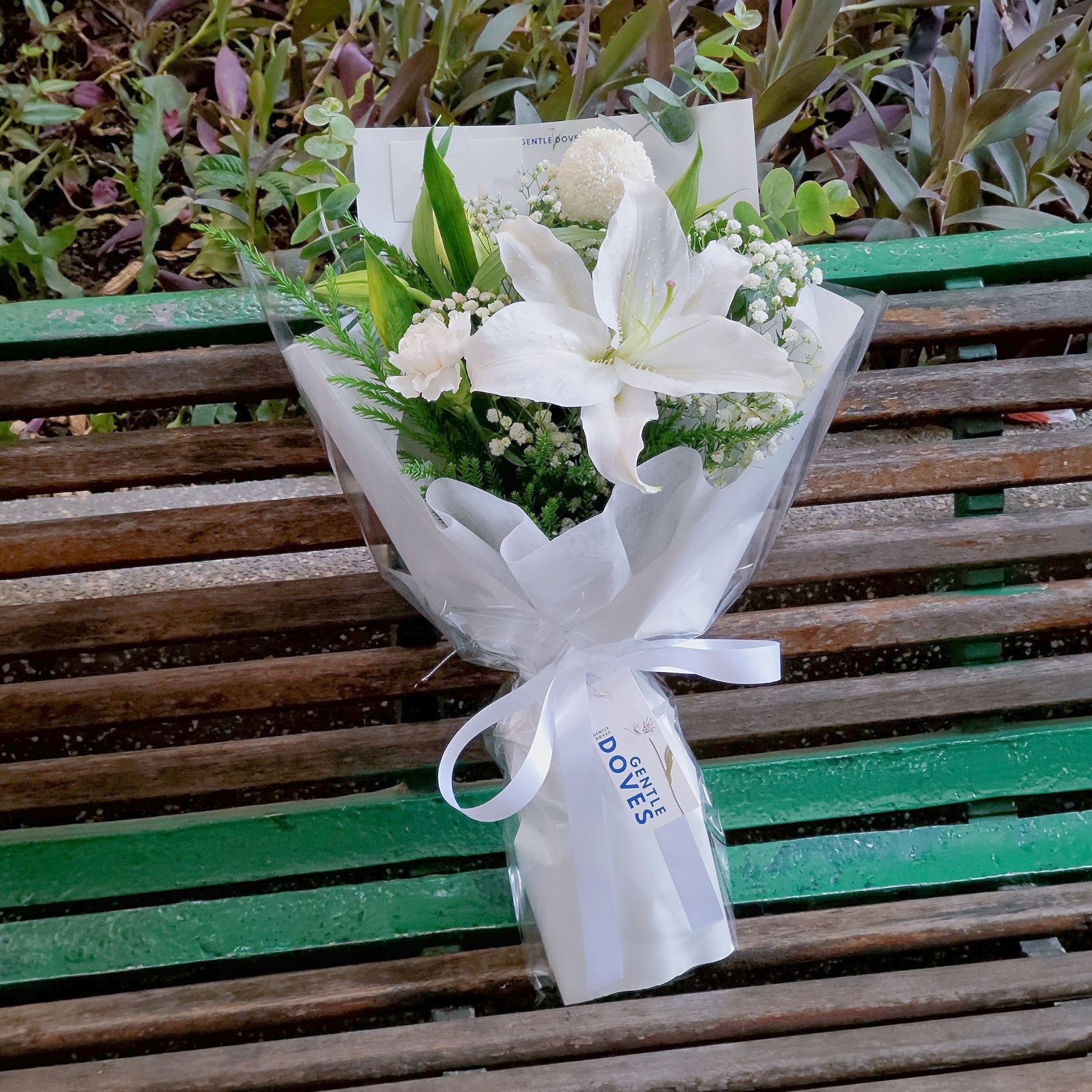 lily flower boutique Single Stem Lily with White Flowers and Foliage Bouquet – Gentle Doves Flower Shop