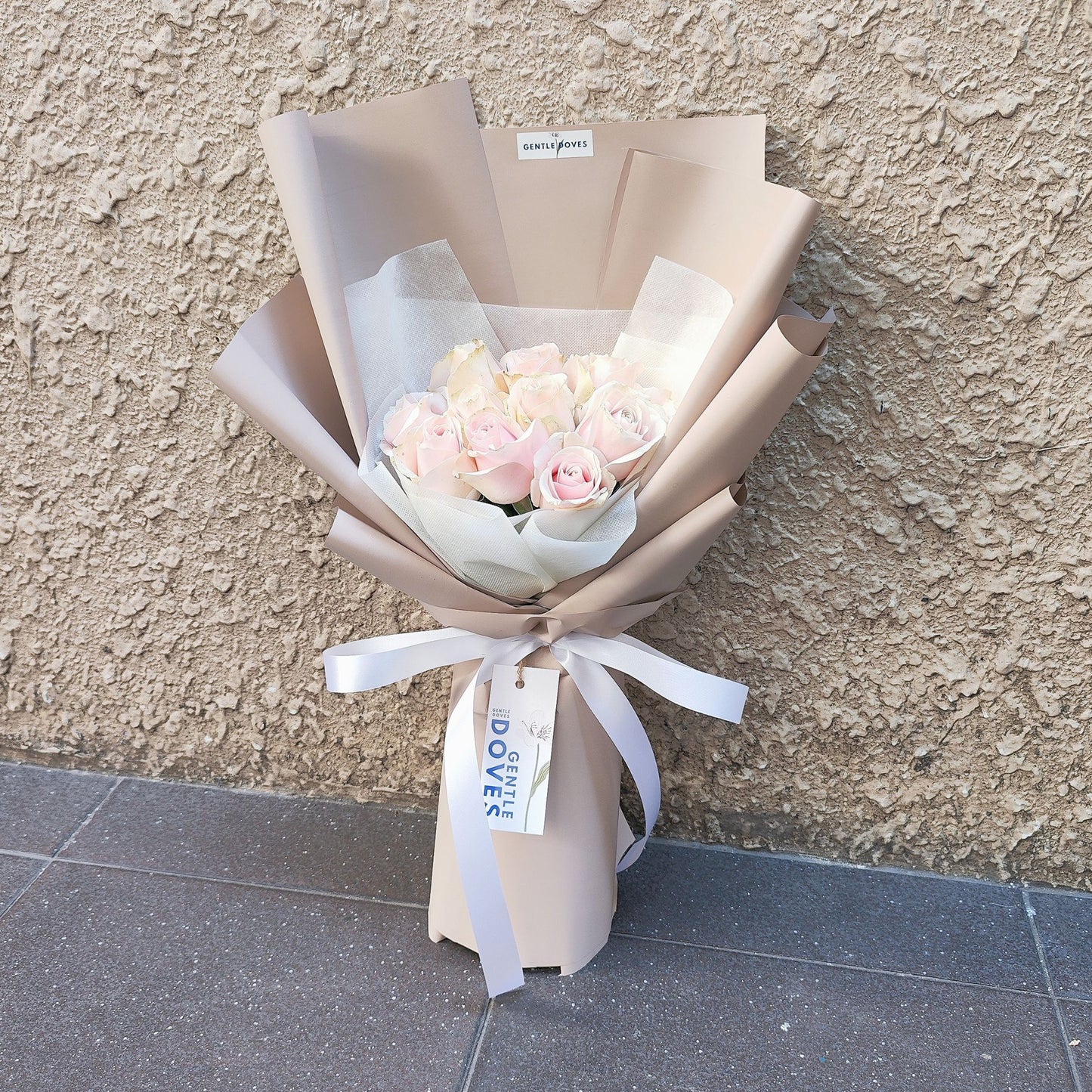 Fifteen Soft Pink Pastel Roses in Cream Color Paper Bouquet