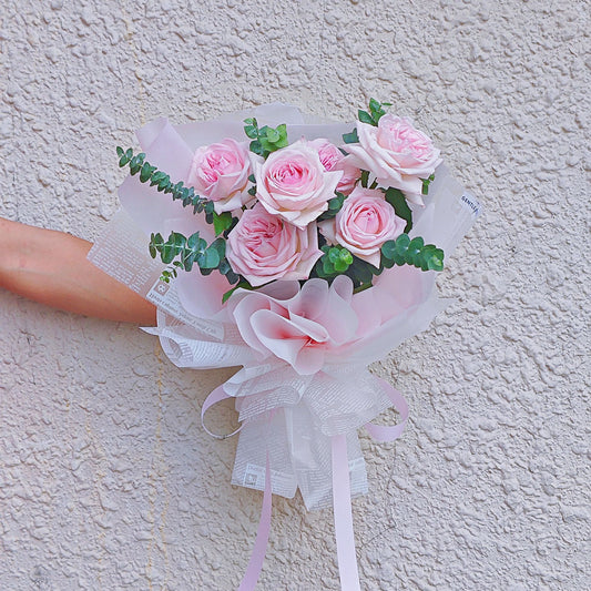 Six Soft Pink English Roses with Eucalpytus in Newspaper Pattern Paper Bouquet