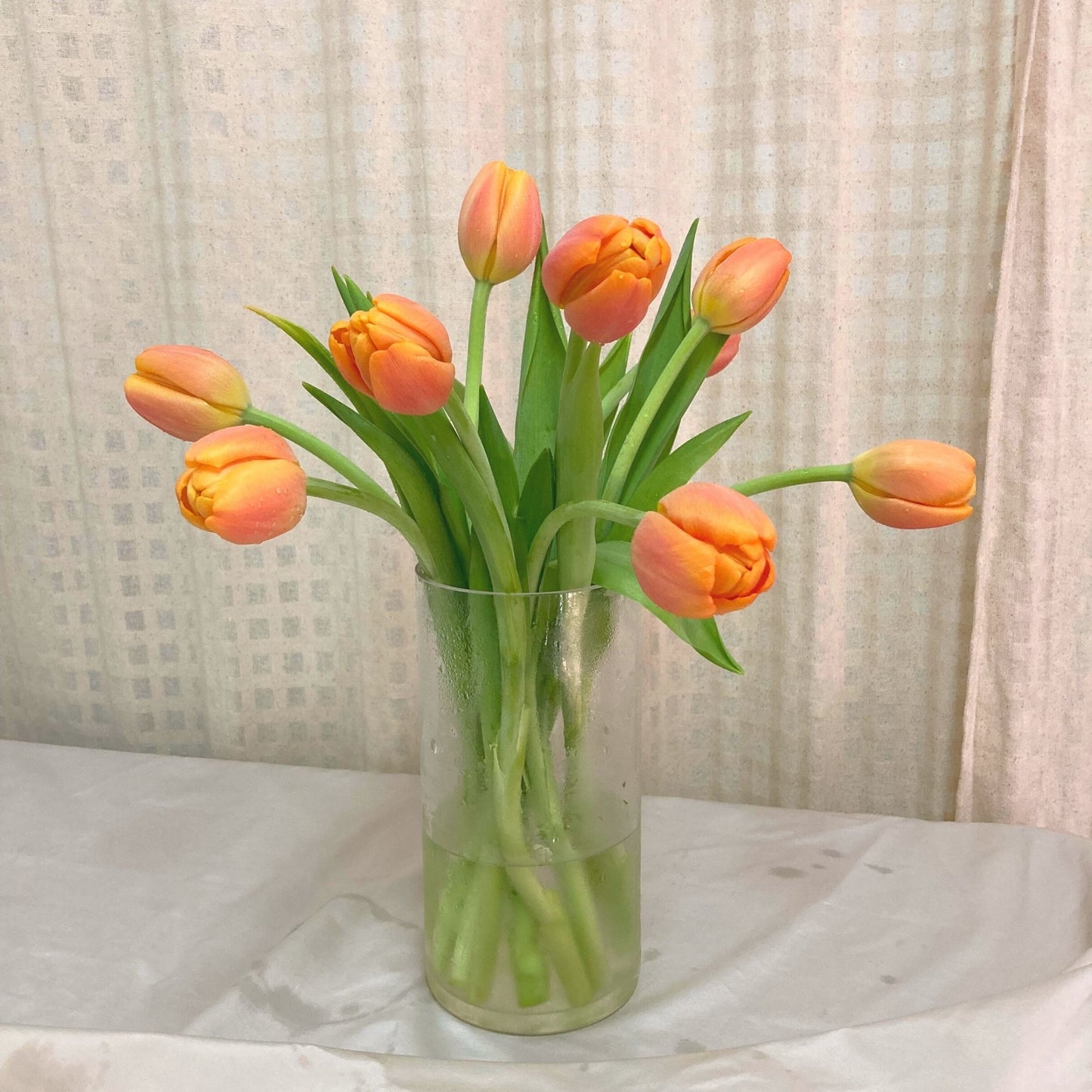 Nine Orange Tulips in Large Vase Arrangement