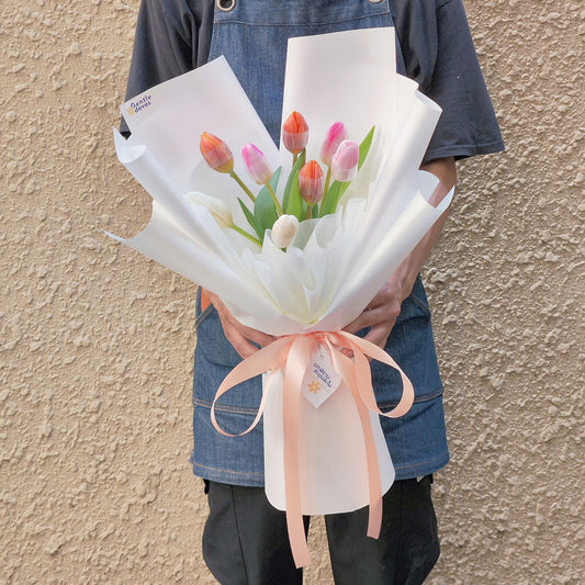 Eight Assorted Color Tulips in White Paper Bouquet