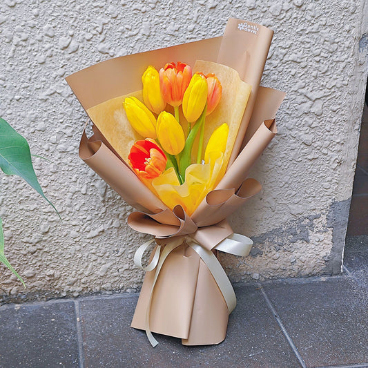 Eight Assorted Yellow and Orange Tulips in Golden Color Paper Bouquet