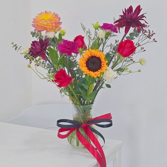 Assorted Purple, Red and Yellow Vivid Colors in Large Vase Arrangement