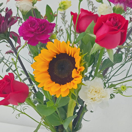 Assorted Purple, Red and Yellow Vivid Colors in Large Vase Arrangement