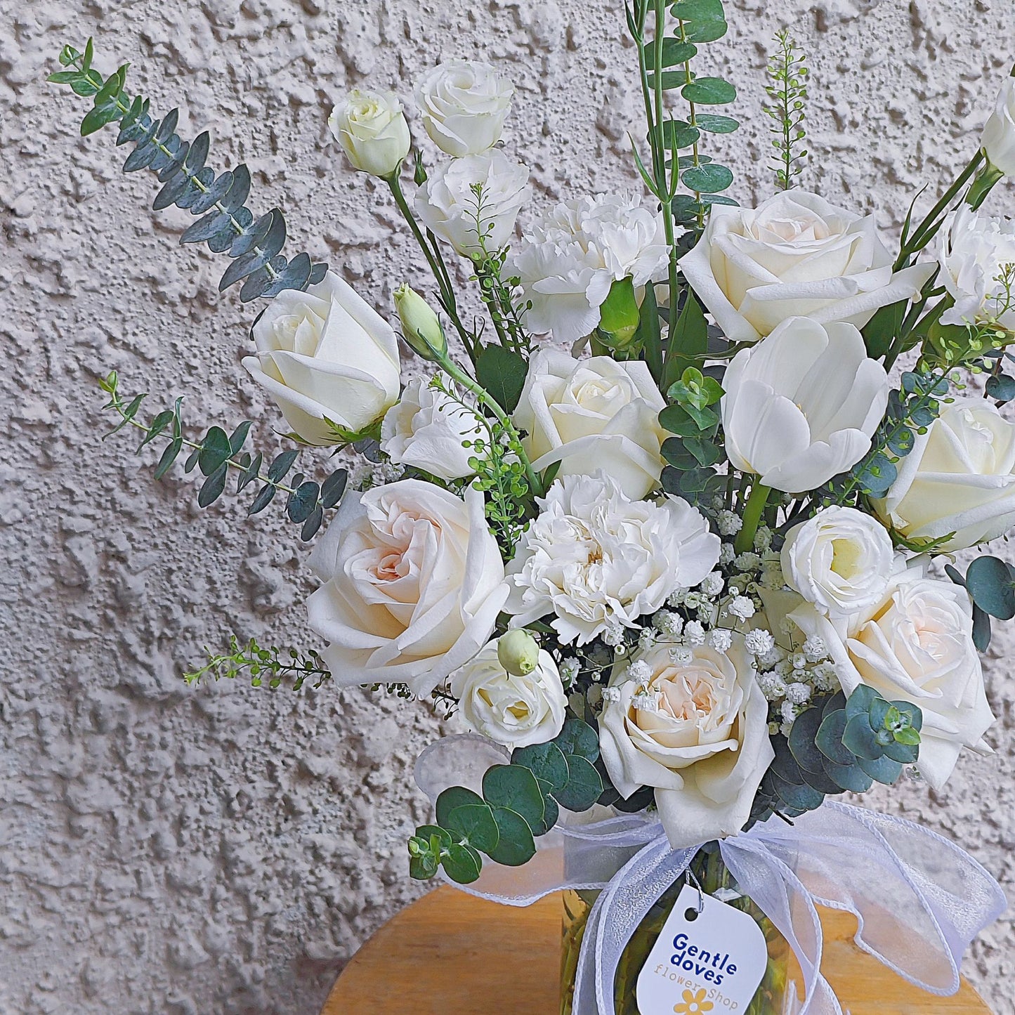 Assorted White Flowers with Tulips in Medium Vase Arrangement.