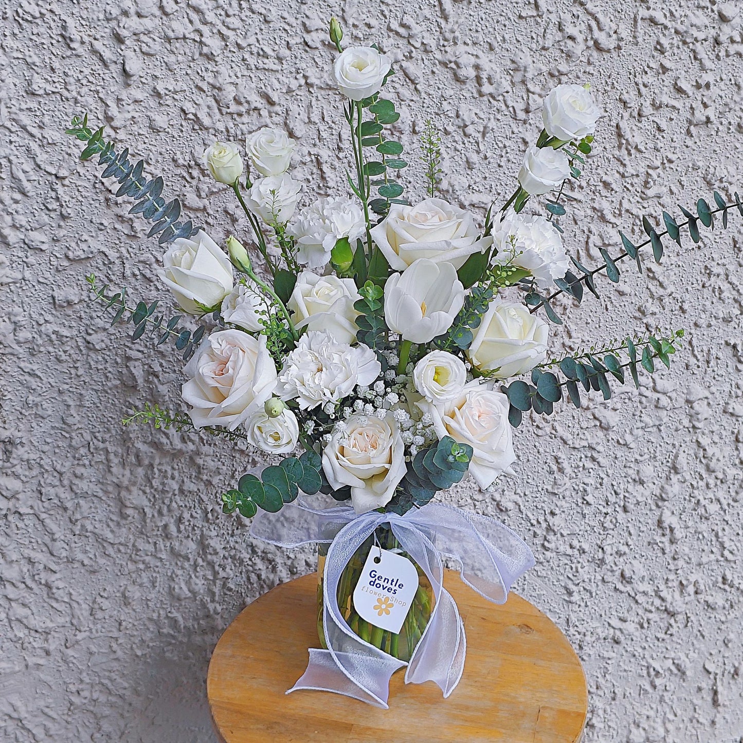 Assorted White Flowers with Tulips in Medium Vase Arrangement.