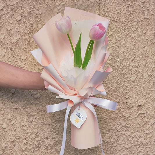 Two Soft Pink Tulips in Pink and White Paper Bouquet