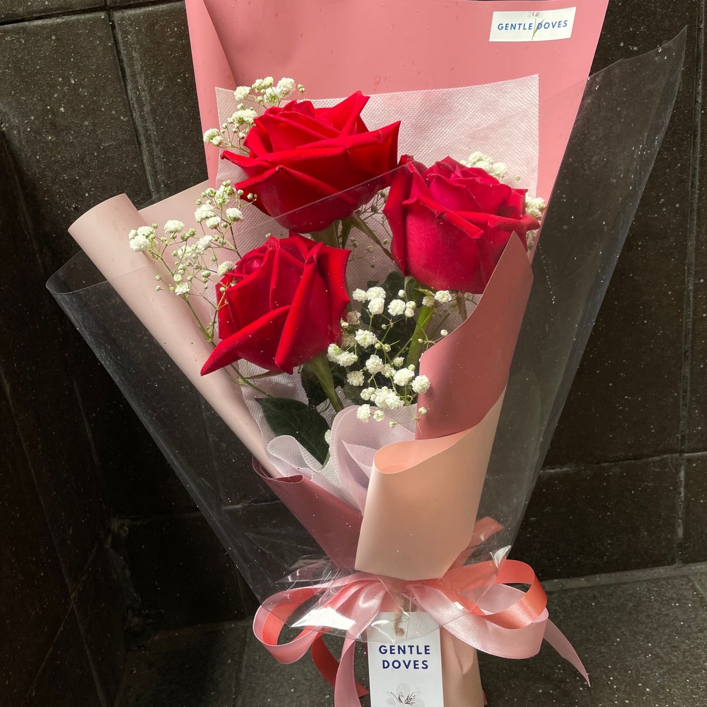 Three Red Roses with Gypsophila Bouquet