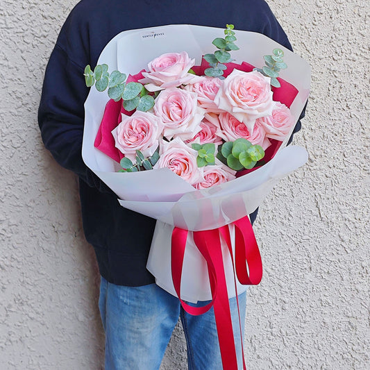 Ten Soft Pink English Roses with Eucalyptus Rounded Bouquet