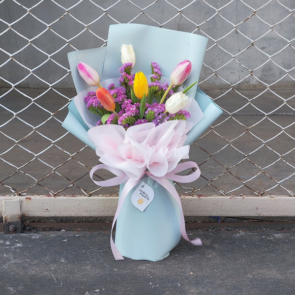 Six Assorted Colorful Color Tulips with Statice Bouquet