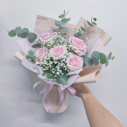 Five Soft Pink English Roses with Gypsophila and Eucalyptus in Soft Pink Paper Bouquet