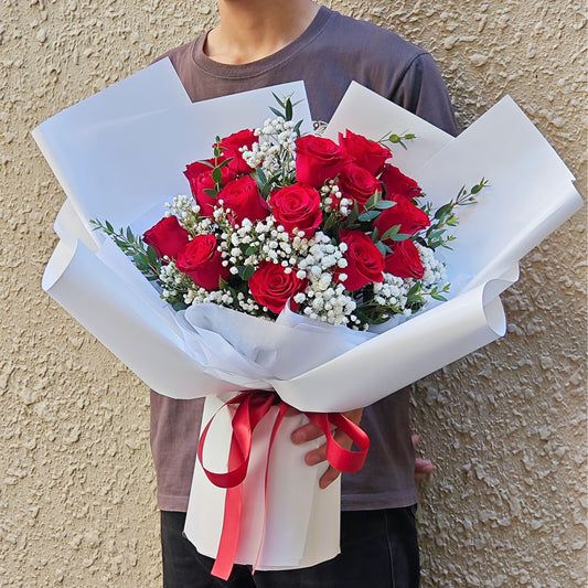 Fifteen Imported Red Roses with Filler Flowers Bouquet