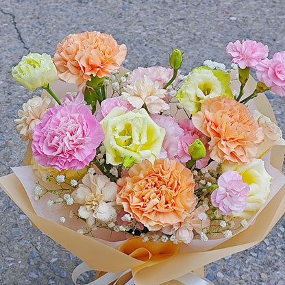 Assorted Pink and Orange Flowers in Small Vase Arrangement