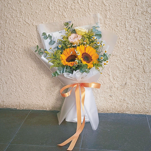 Two Sunflowers in Bushes with Daisies Bouquet