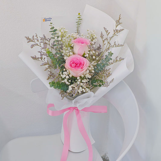 Two Imported Pink Roses with Filler Flowers Bouquet