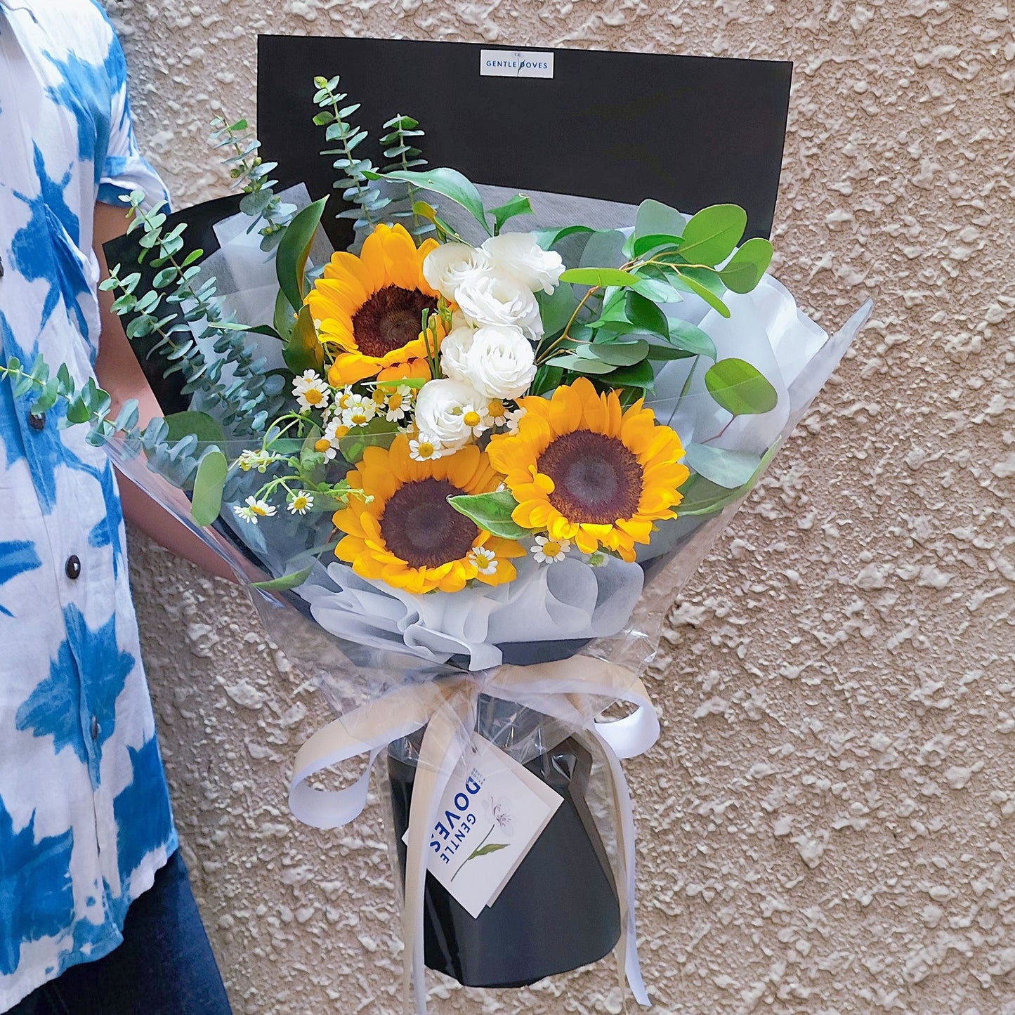 Three Sunflowers with Daisies, White Flowers and Green Foliage Bouquet