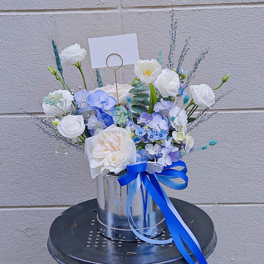 Blue and White Flowers in Small Box Arrangement