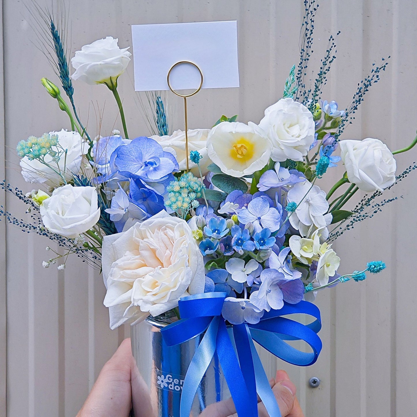 Blue and White Flowers in Small Box Arrangement