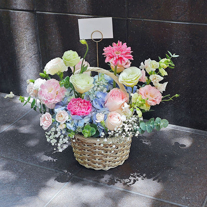 Assorted Pink Flowers with Blue Hydrangea in Small Basket