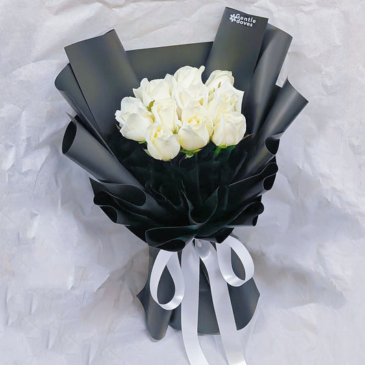 Ten White Roses in Black Paper Bouquet