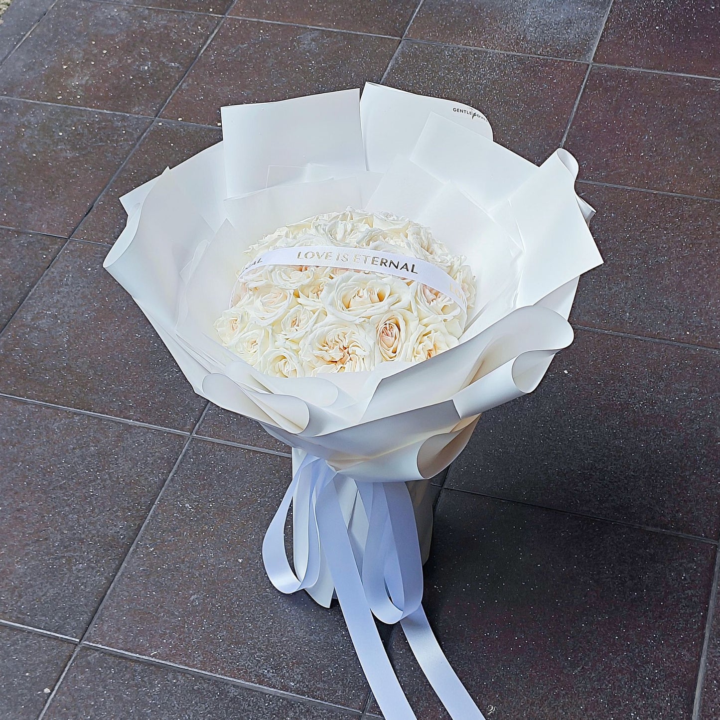 Thirty White English Roses in White Paper Bouquet