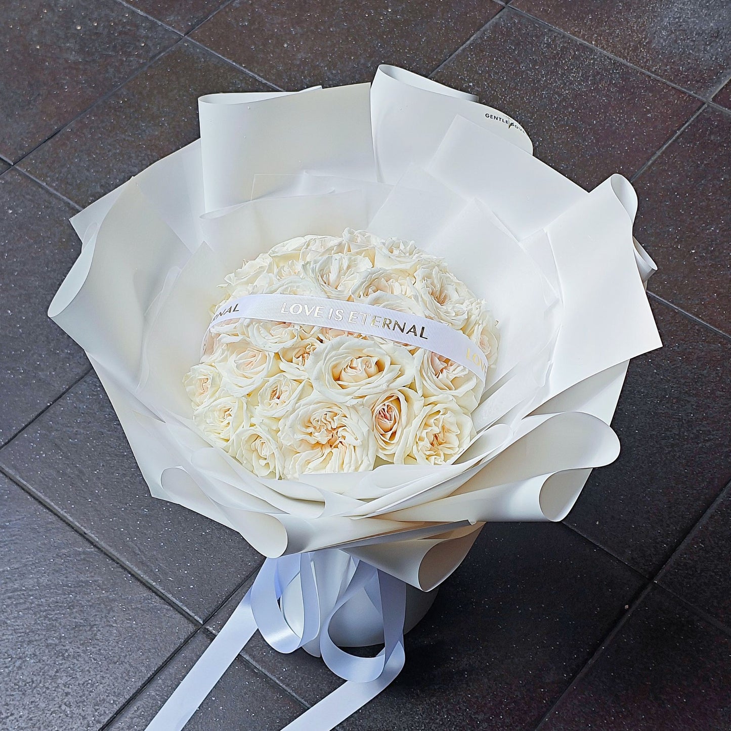 Thirty White English Roses in White Paper Bouquet