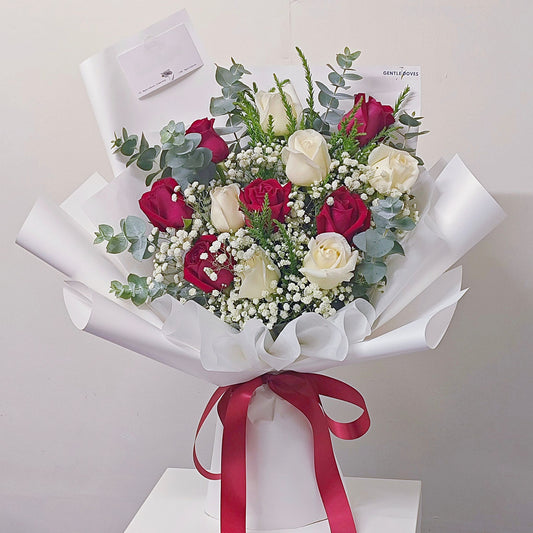 Twelve Red and White Roses with Green and White Foliage Bouquet