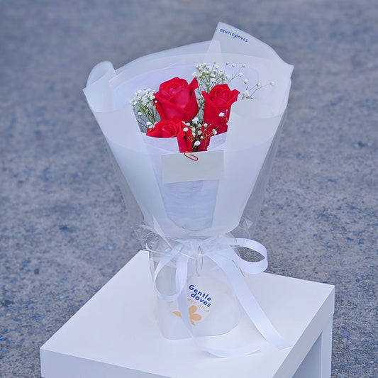 Four Red Roses with Gypsophila Small Bouquet