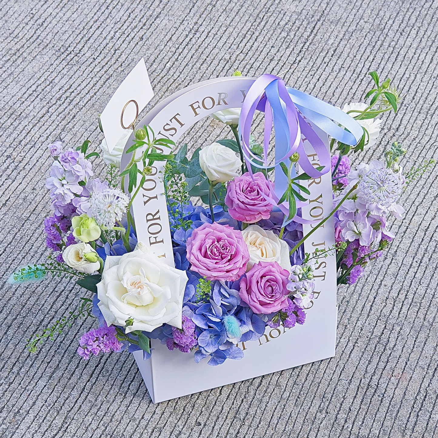 Assorted Soft Purple, Blue and White Flowers in Medium Carrying Flower Box