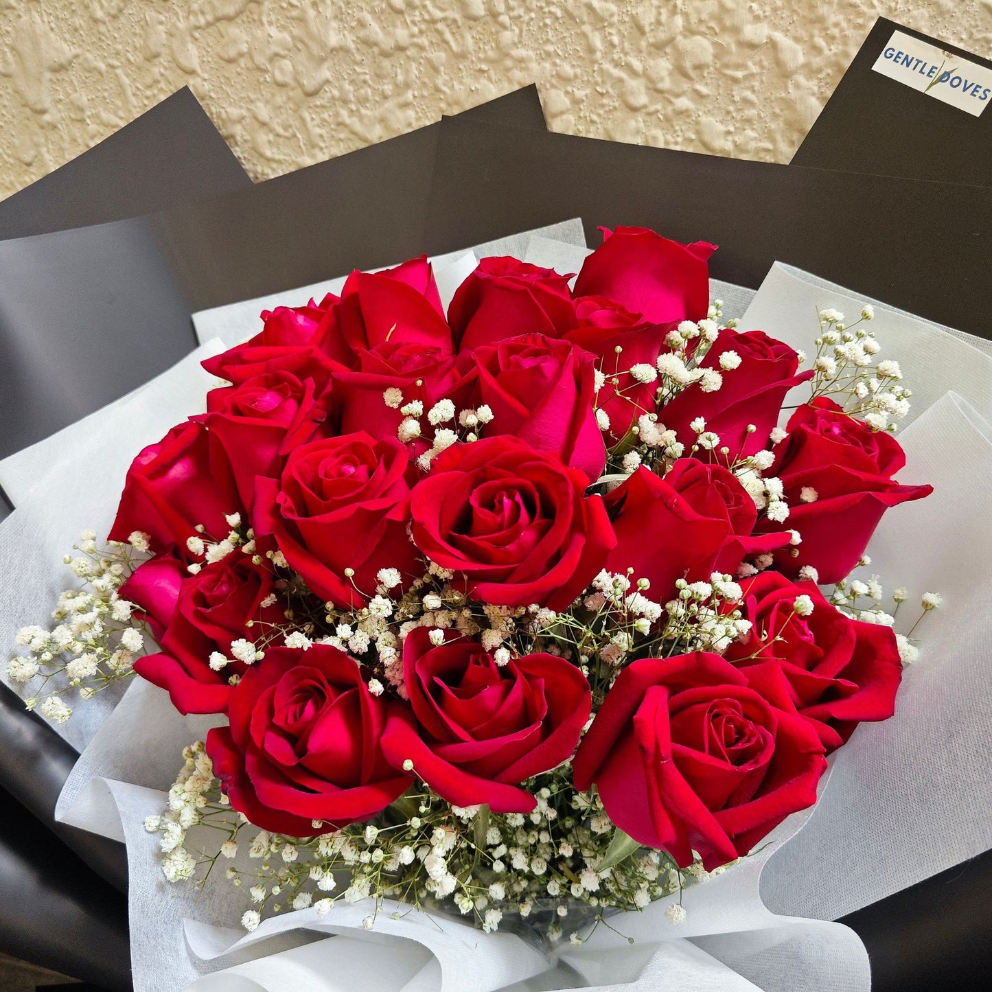 Twenty Red Roses with Gypsophila in Black Paper Extra Large Bouquet