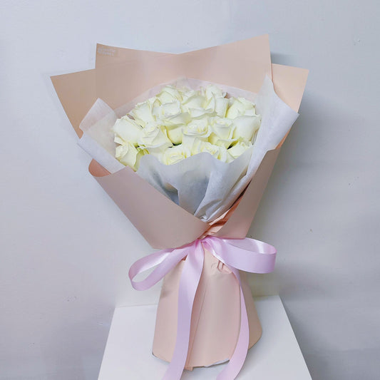 Twenty White Roses in Creamy Paper Bouquet