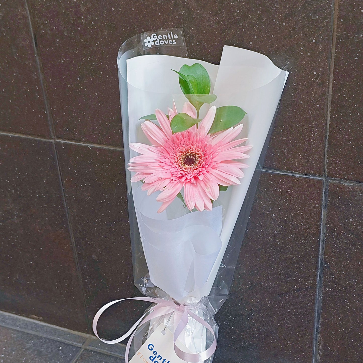 Single Pink Gerbera in White Paper Minimal Bouquet