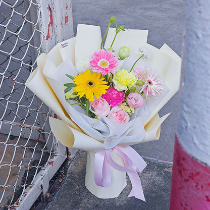Pink and Yellow Gerberas with Assorted Flowers Medium Size Bouquet