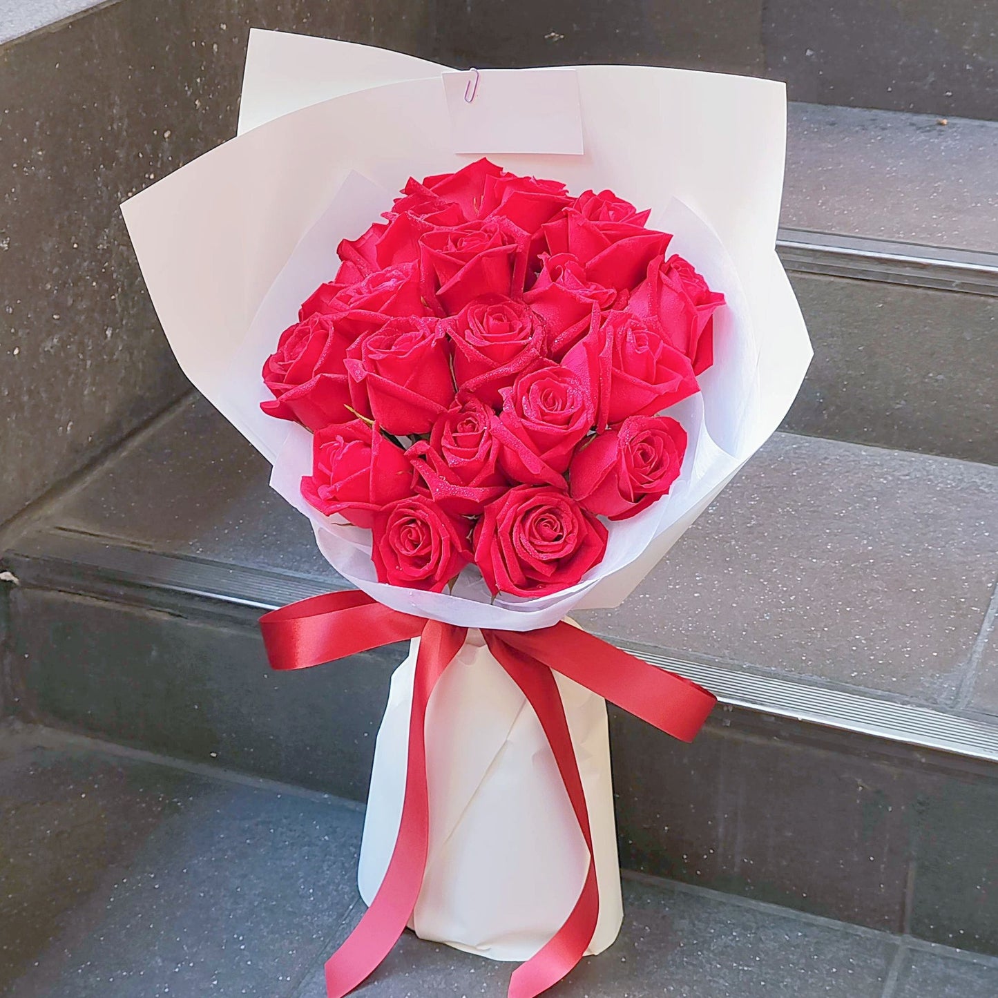 Twenty Red Roses in White Paper Bouquet