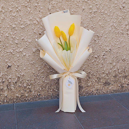 Three Yellow Tulips in Soft Yellow Paper Bouquet