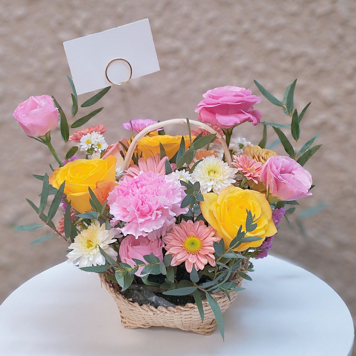 Assorted Pink and Yellow Mini Basket Arrangement