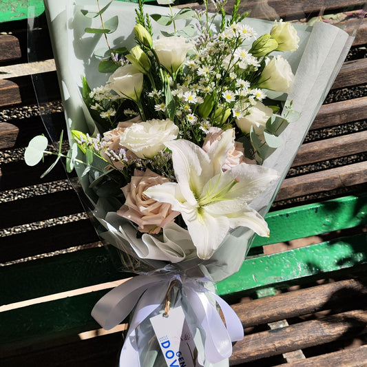 Assorted White Tone Flowers in Pastel Green Paper Bouquet