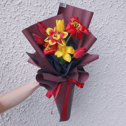 Eight Yellow and Red Tulips in Dark Red Paper Bouquet