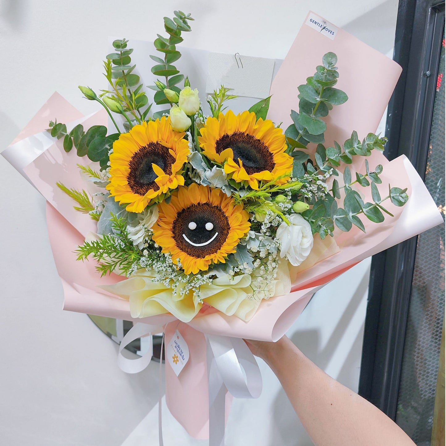 Three Sunflowers with Smile and Green Foliage Bouquet