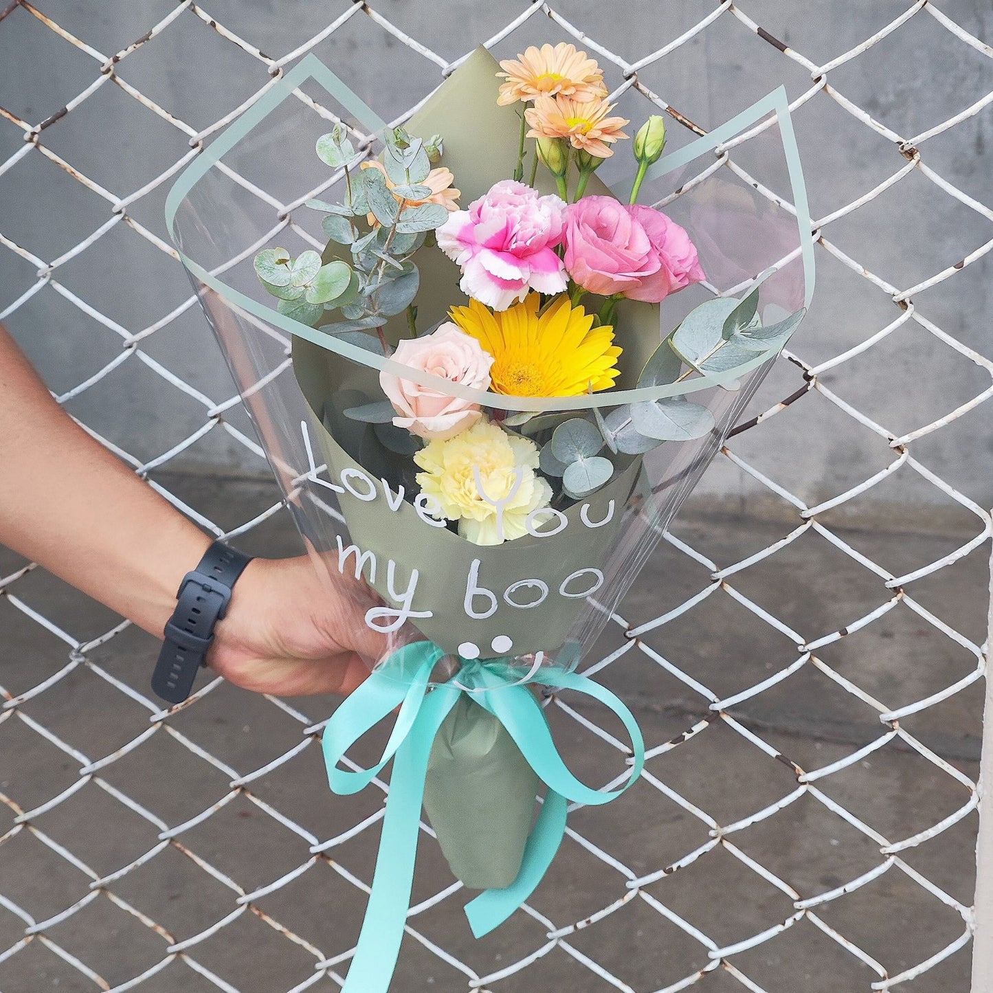 Assorted Minimal Flowers in Green Paper Wrapping Bouquet