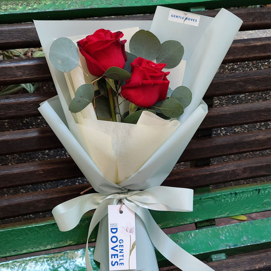 Two Red Roses with Silver Dollar Eucalyptus Bouquet