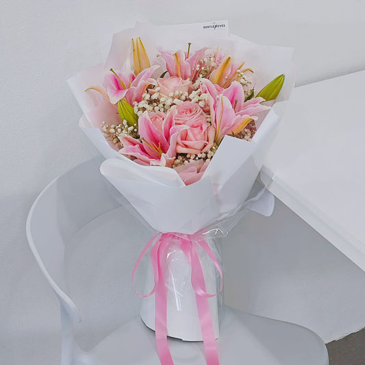 Pink Lilies and Soft Pink Roses with Gypsophila in White Paper Bouquet