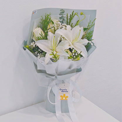 White Lilies with White Roses and Foliage Small Bouquet