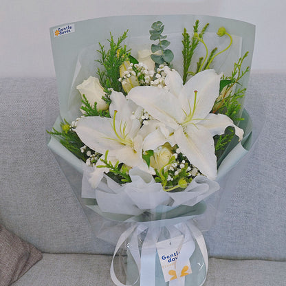 White Lilies with White Roses and Foliage Small Bouquet
