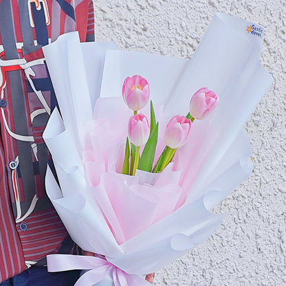 Four Soft Pink Tulips in White and Pink Paper Bouquet