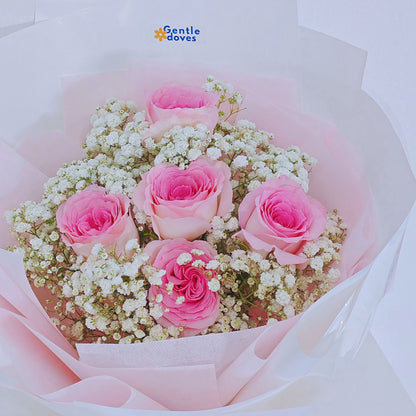 Five Pink Roses with Gypsophila in White Paper Bouquet